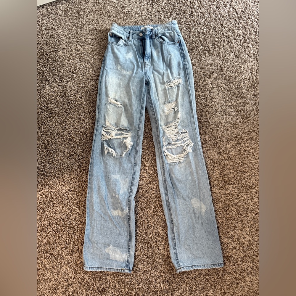 distressed baggy light wash jeans